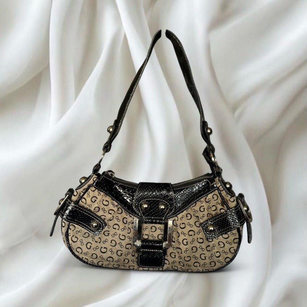 Y2K vintage Guess shoulder bag features brown monogram pattern and silver buckle